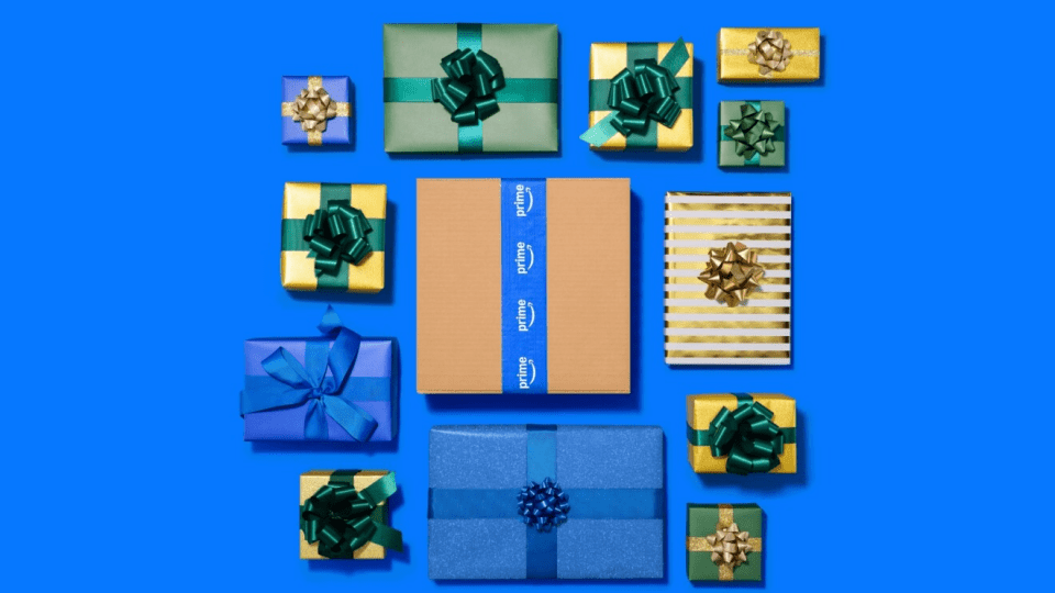 An Amazon Prime box surrounded by multiple wrapped presents.