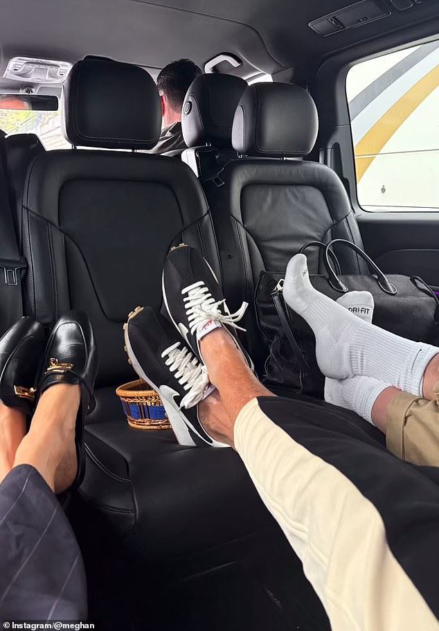 Meghan appeared to brush off criticism as she posted another video of her feet up in the car