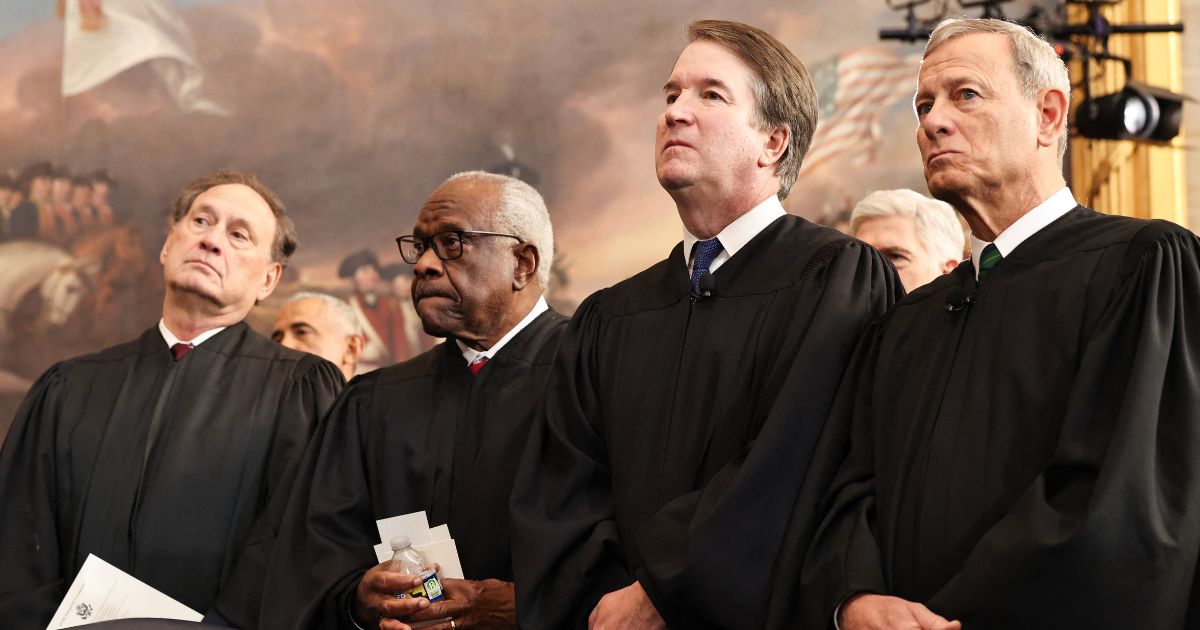 Associate Supreme Court Justices Samuel Alito, Clarence Thomas, and Brett Kavanaugh, and U.S. Chief Justice John Roberts, look on during inauguration ceremonies in the Rotunda of the U.S. Capitol on Jan. 20, 2025, in Washington, D.C.
