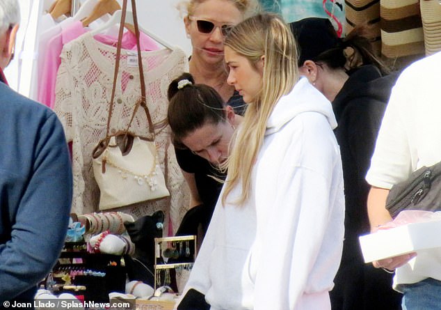 Harper was seen checking out the market wares during the shopping trip with her mum