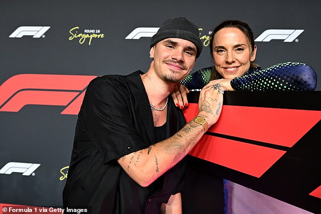 Romeo missed the trip because he opted to attend the Singapore Grand Prix where he posed for snaps on Sunday with stars including Mel C (pictured) and Jack Whitehall