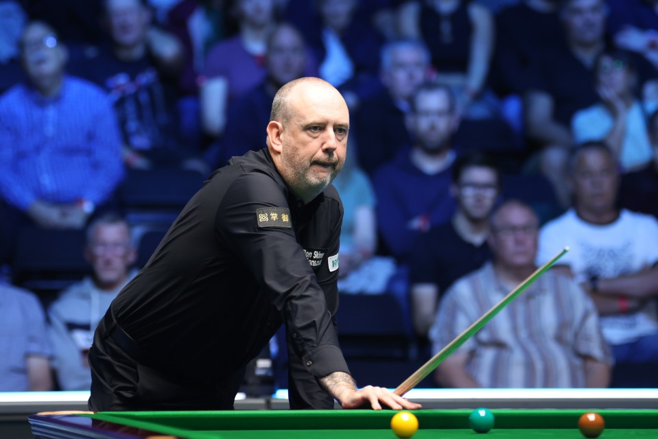 Mark J Williams of Wales reacting during a snooker match.