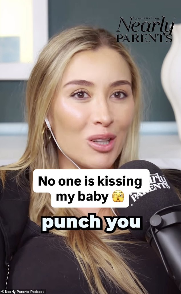 Speaking on their Nearly Parents podcast, Sophie said: 'No one's f*****g kissing my baby. And I'm gonna say this on this podcast: If anyone comes and kisses my newborn baby, I will punch you in the face'