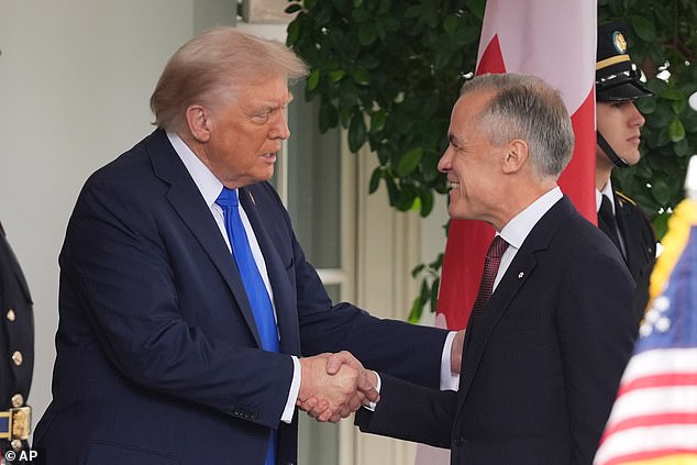 President Donald Trump greets Canadian Prime Minister Mark Carney at the White House, Tuesday