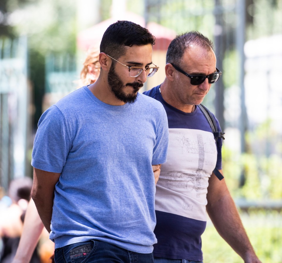 Tinder swindler Simon Leviev being escorted by a man in Athens.
