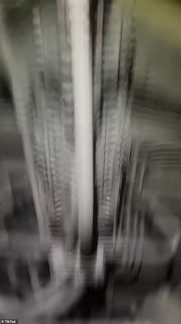 In a separate clip, Mukhtarov is lying on the tracks and filming the undercarriage of a passing train