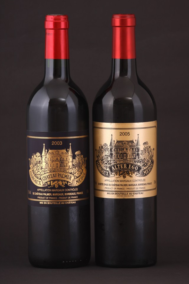Two bottles of French red wine: Chateau Palmer 2003 and Alter Ego 2005.