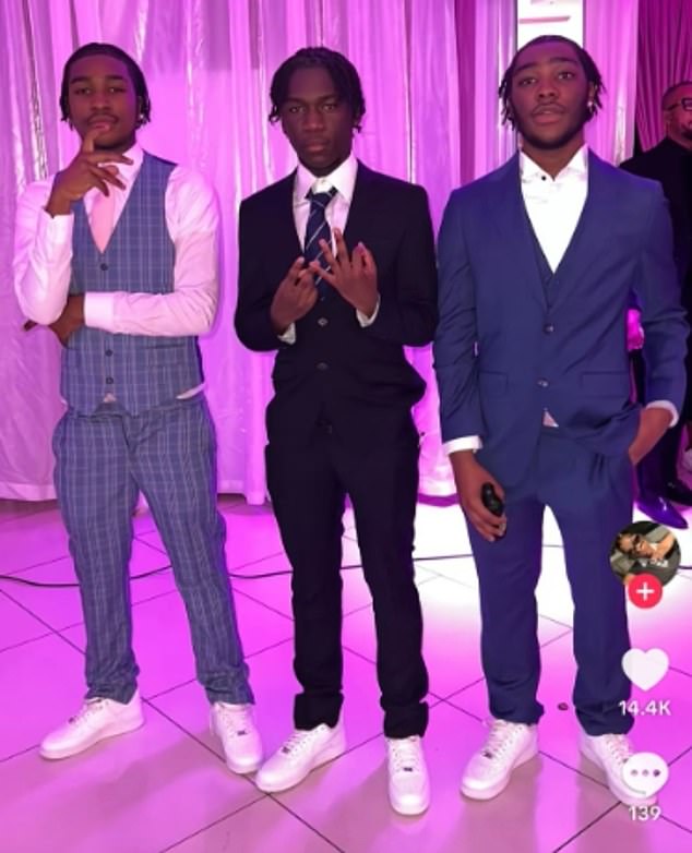 Marcus (C) is pictured alongside two friends. Marcus began a holiday romance with the girl after they met at the £210-a-night Hilton Dubai Palm Jumeirah