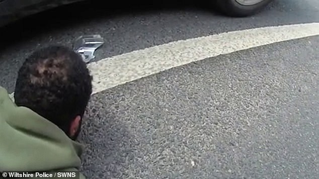 Henriques, who police called one of the 'worst drivers' they'd ever seen, eventually had the tyres of his vehicle punctured by a stinger device (he is seen being arrested)