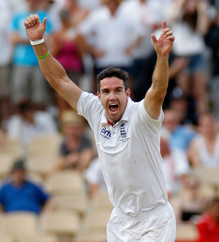 England's Kevin Pietersen celebrates after Alastair Cook catches Australia's Michael Clarke out in an Ashes Test match.