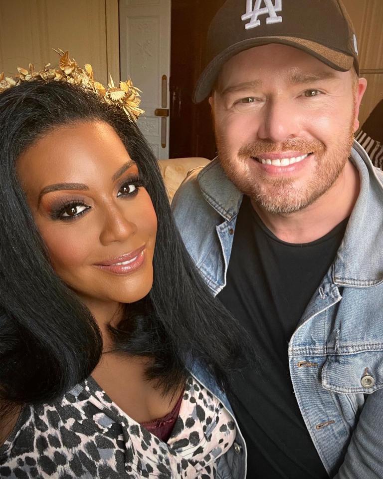 Alison Hammond and Mikey Phillips smiling at the camera.