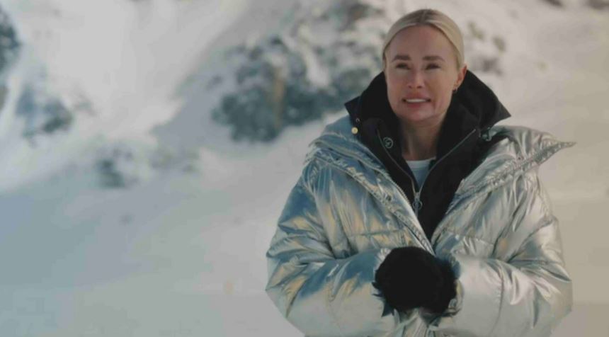 Woman from Married At First Sight wearing a silver puffer coat on her honeymoon.