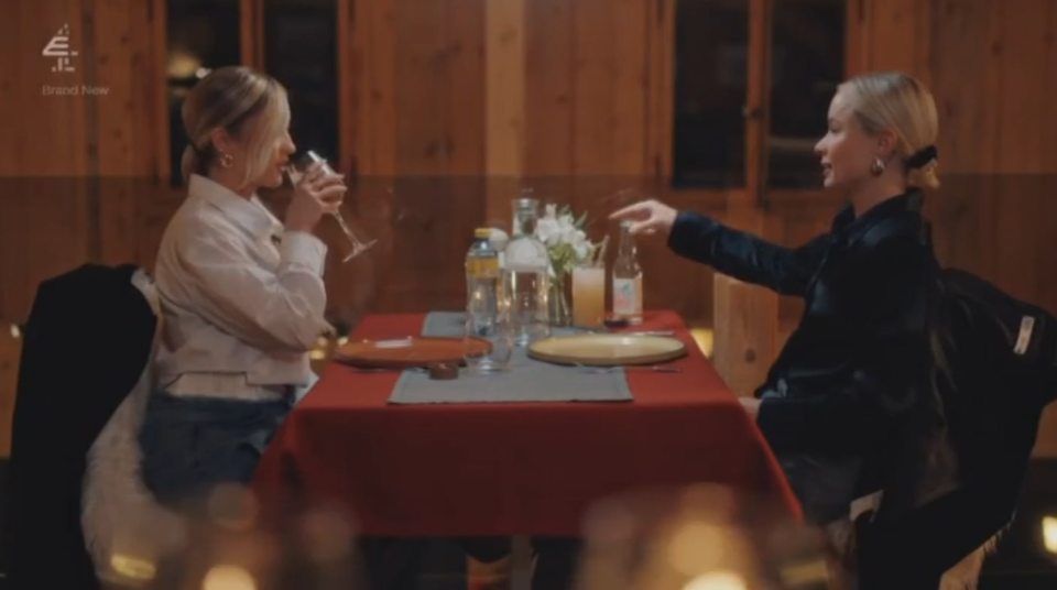 Leigh and Leah from Married at First Sight (MAFS) having a drink at a table.