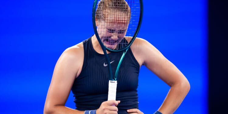 Tennis star, 18, breaks down in tears multiple times & demands cameraman stop filming her in worrying mid-match meltdown