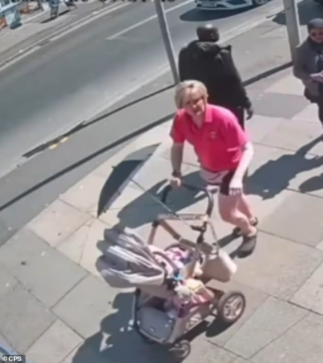 A woman seen pushing the pram away after the incident