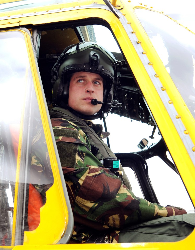 Prince William at the controls of a Sea King helicopter.