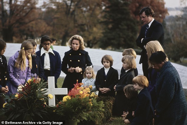 The Kennedy family pays tribute at Robert F Kennedy's grave on what would have been his 47th birthday, at Arlington National Cemetery in Virginia on November 20, 1971
