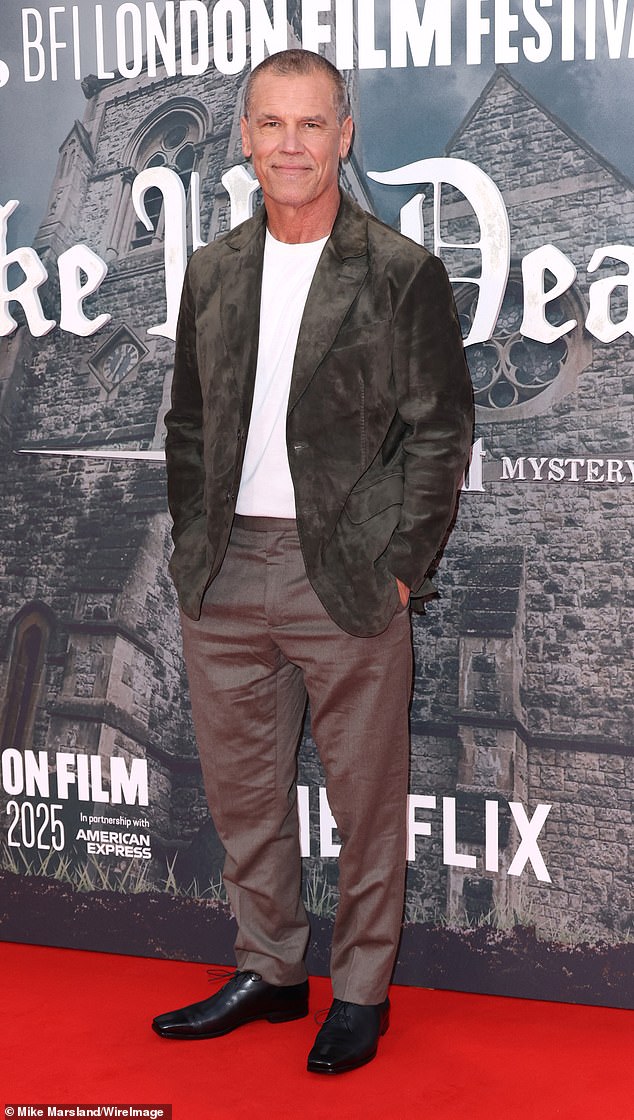 Meanwhile Josh Brolin kept it casual in grey tailored trousers, a white t-shirt and a green velvet blazer