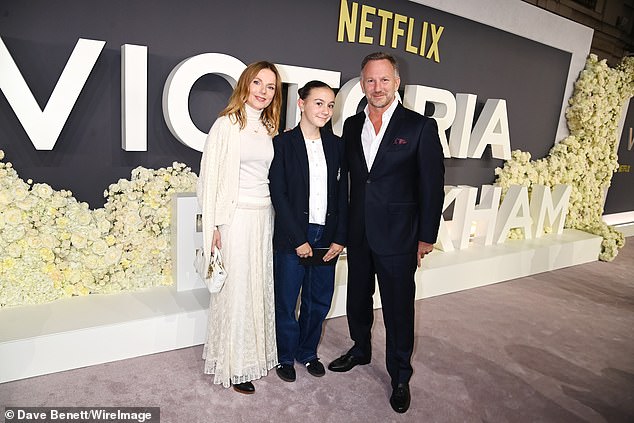 Geri Horner-Halliwell was dressed in her trademark white as she posed for the cameras with her stepdaughter Olivia and husband Christian