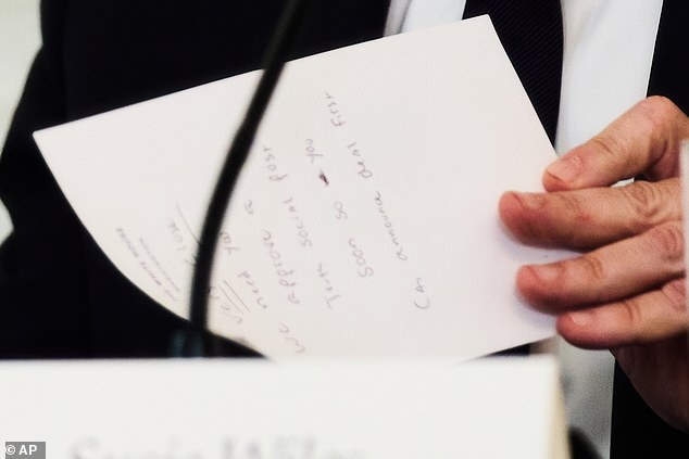 The note handed by Rubio to Trump appeared on camera as the president read it over. 'Very close. We need you to approve a post on Truth Social soon, so you can announce the deal first,' it says