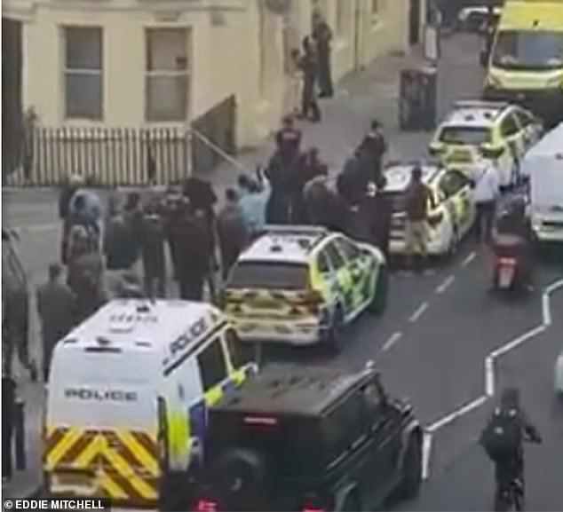 Onlookers watched the extremely expensive paint being flung around