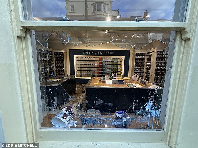 A man smashed the windows and trashed the posh shop Farrow & Ball in Hove, covering it in paint