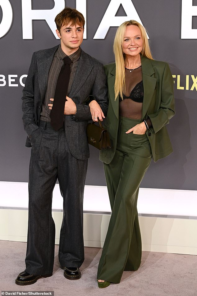 She looked incredibly chic in a khaki green VB suit, complemented with a stylish bag from the collection