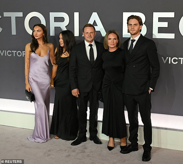 Also there for the knees up, which began with a champagne reception in the opulent cinema, were Victoria's sister Louise and her children