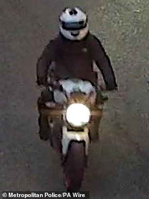 The shooter (seen here in a CCTV still) has never been traced