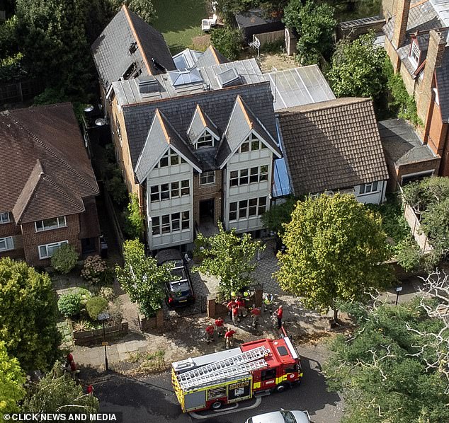 She placed the fire-ravaged place up for sale for £4million in May 2024 but dropped the price just three months into the sale (pictured after the fire in September 2023)