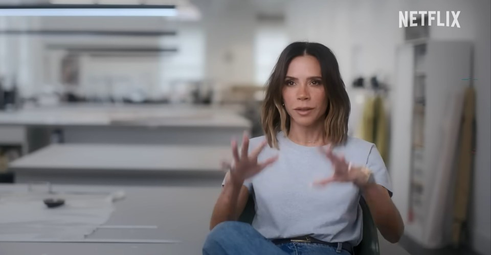 Victoria Beckham speaking in an interview with the Netflix logo in the top right corner.