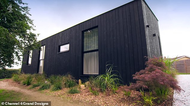 Others criticised the flat roof design and black wooden cladding, calling it 'very boring' and 'unrelentingly black'