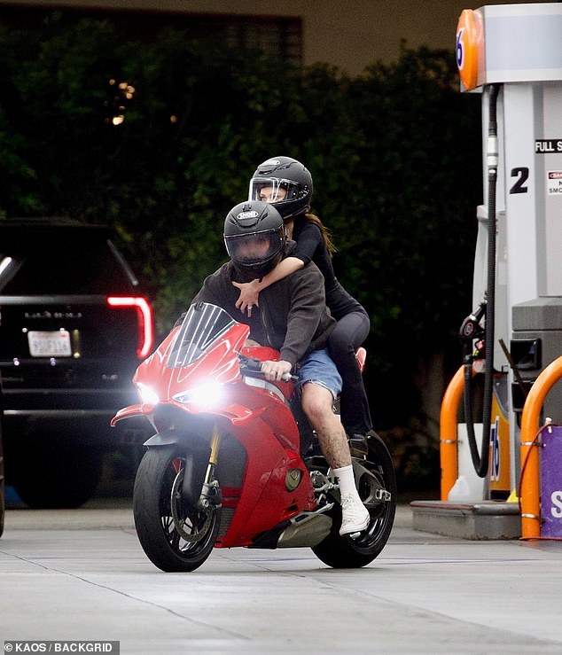 With her hand across his chest, the actress flashed her huge diamond wedding ring as the loved-up couple looked more smitten than ever
