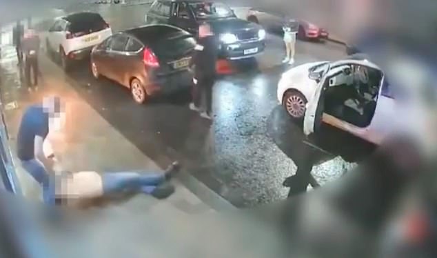 Their victim can be seen on disturbing CCTV footage - jumping backwards and hauling himself to the ground in an attempt to quell the fire