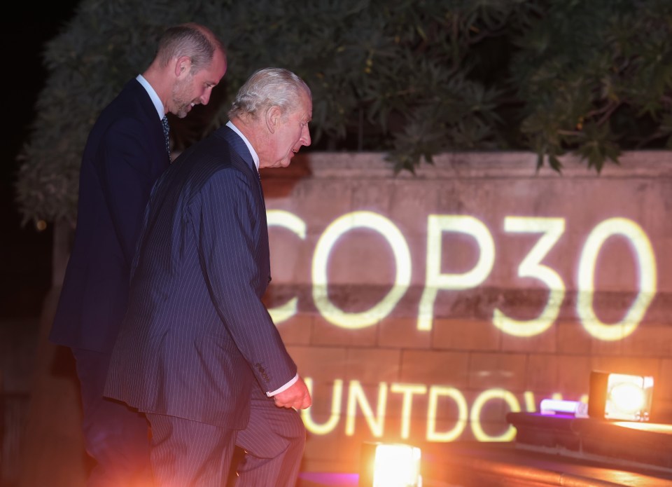 King Charles III speaks at a podium during the World Climate Action Summit at Cop28.