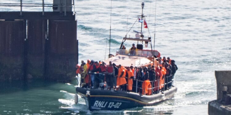 Tiny number of migrants returned to France under 'one-in, one-out' deal revealed as 35k cross Channel so far this year