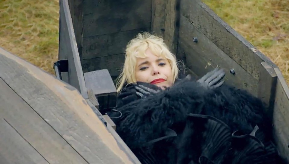 Paloma Faith in a coffin, attending her own funeral.