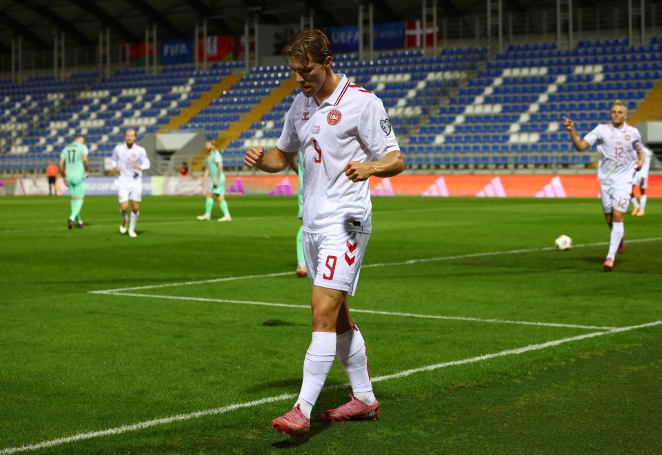 Denmark's Rasmus Hojlund celebrates scoring their second goal.