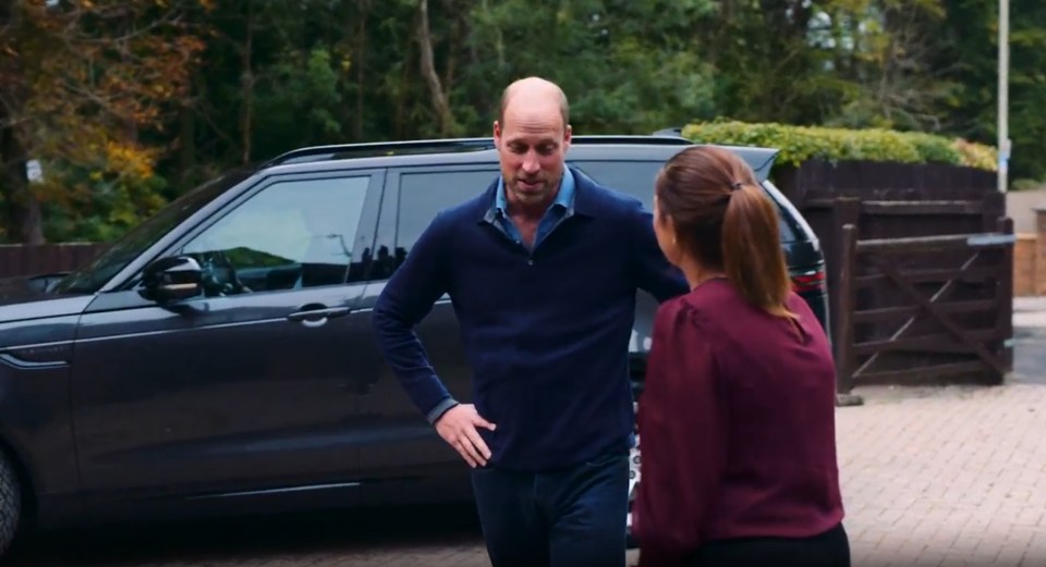 Prince William speaking with Rhian Mannings.