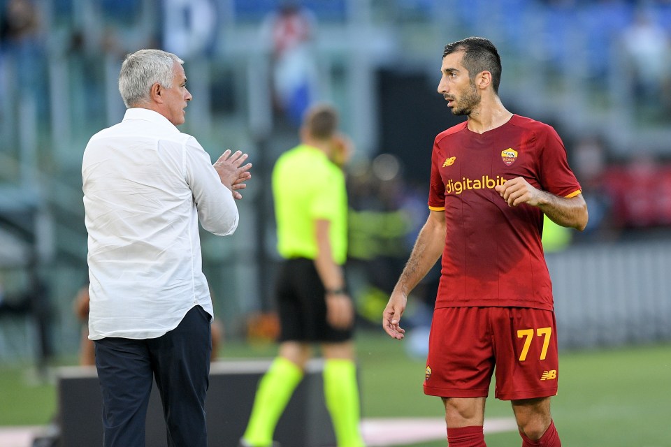 AS Roma manager Jose Mourinho giving instructions to Henrikh Mkhitaryan during a soccer match.