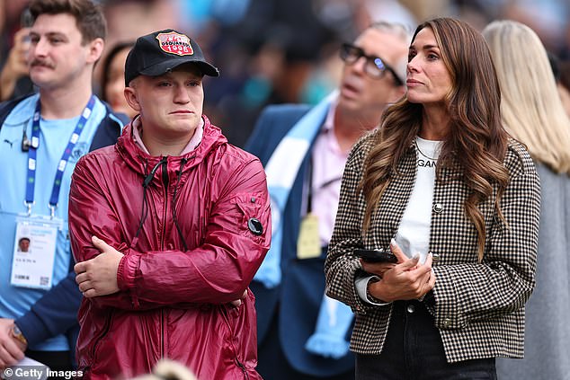 His son Campbell cut a tearful expression as the banner was unveiled at the Etihad last month