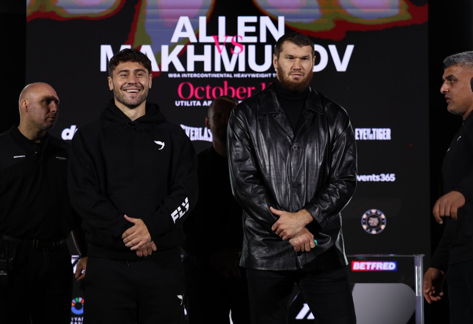 Dave Allen and Arslanbek Makhmudov at a press conference.