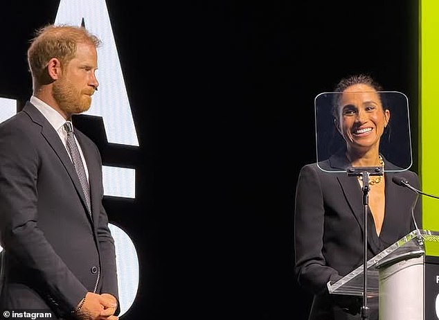 Meghan Markle has voiced fears she and Prince Harry share about their children growing up in a digital age as they accepted an award on stage in New York for their humanitarian efforts