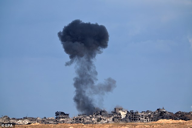 Smoke rises following an Israeli airstrike on the northern part of the Israel-Gaza border, as seen from southern Israel, 10 October 2025, despite a ceasefire agreement between Israel and Hamas under the first phase of the Gaza peace plan