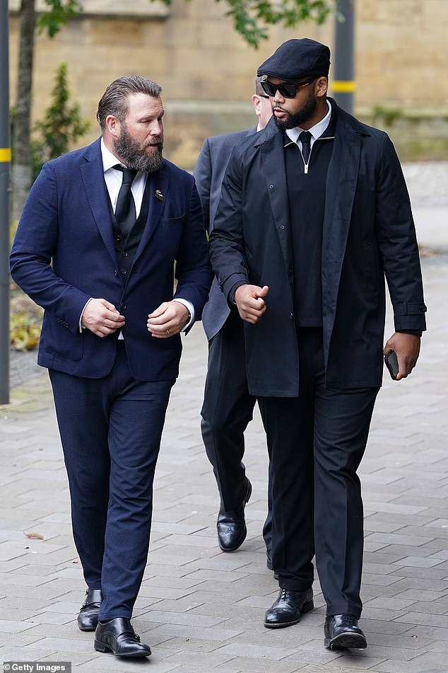 Former boxer Scott Welch and Frazer Clarke arrive at Manchester Cathedral this morning