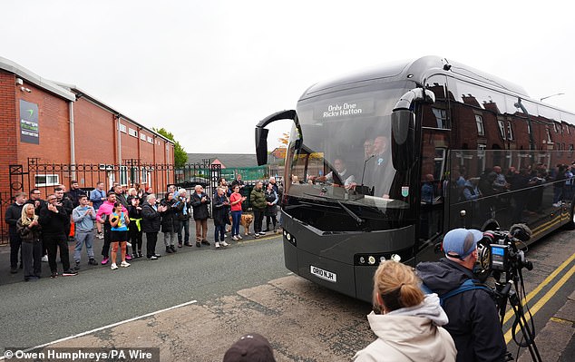A bus with a sign saying 'Only One Ricky Hatton' passes outside Hatton's Gym today