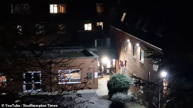Footage filmed outside the Highfield House Hotel in Southampton, Hampshire, shows a bearded man in a red top shouting up at someone before the man outside begins to climb towards a first-floor window