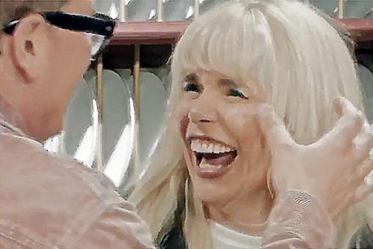 Alan Carr poisoning Paloma Faith by touching her face on Celebrity Traitors.