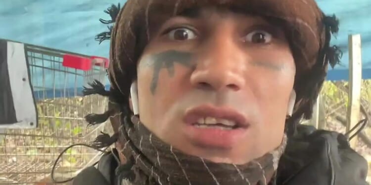 Asylum seeker GUILTY of threatening to kill Nigel Farage after posting chilling 'pop, pop, pop' gun gesture vid