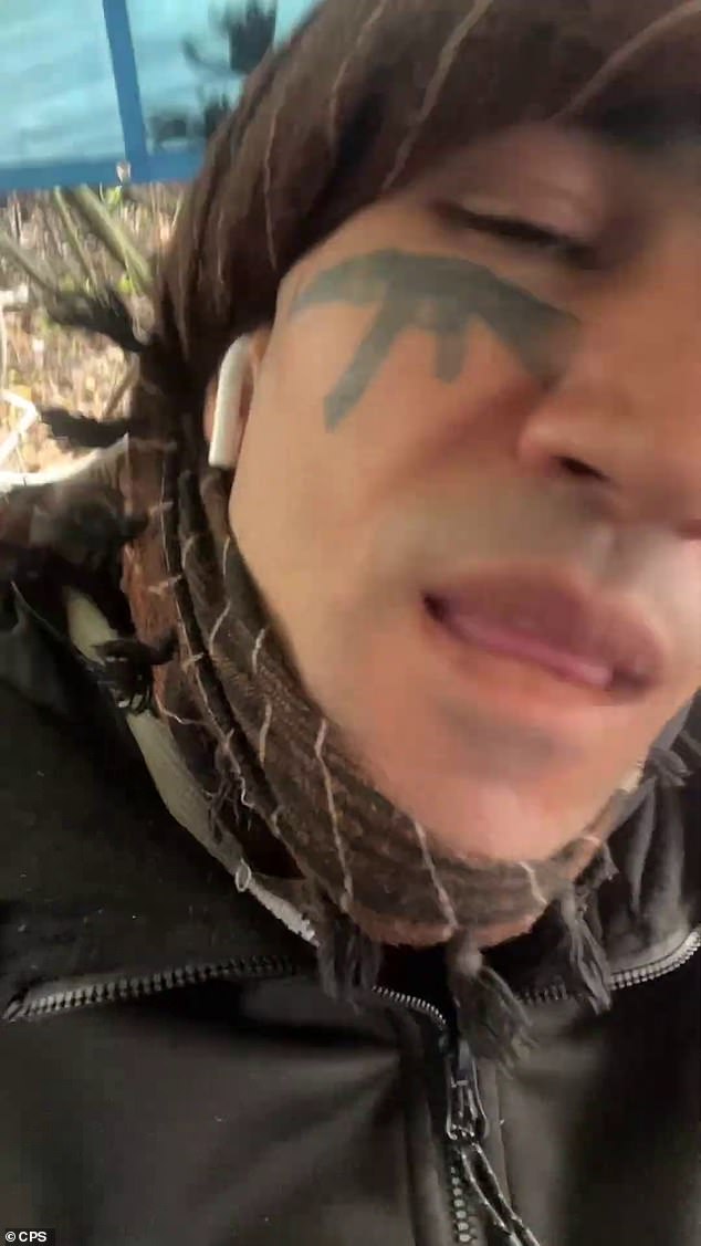 Khan has an AK47 tattooed on his left cheek, seen clearly in this video posted on his TikTok account